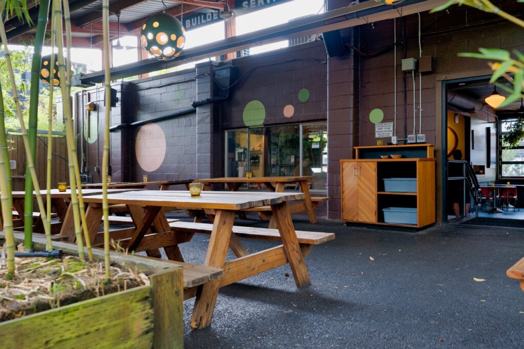 Patio picnic tables at The Bye and Bye vegan bar on NE Alberta