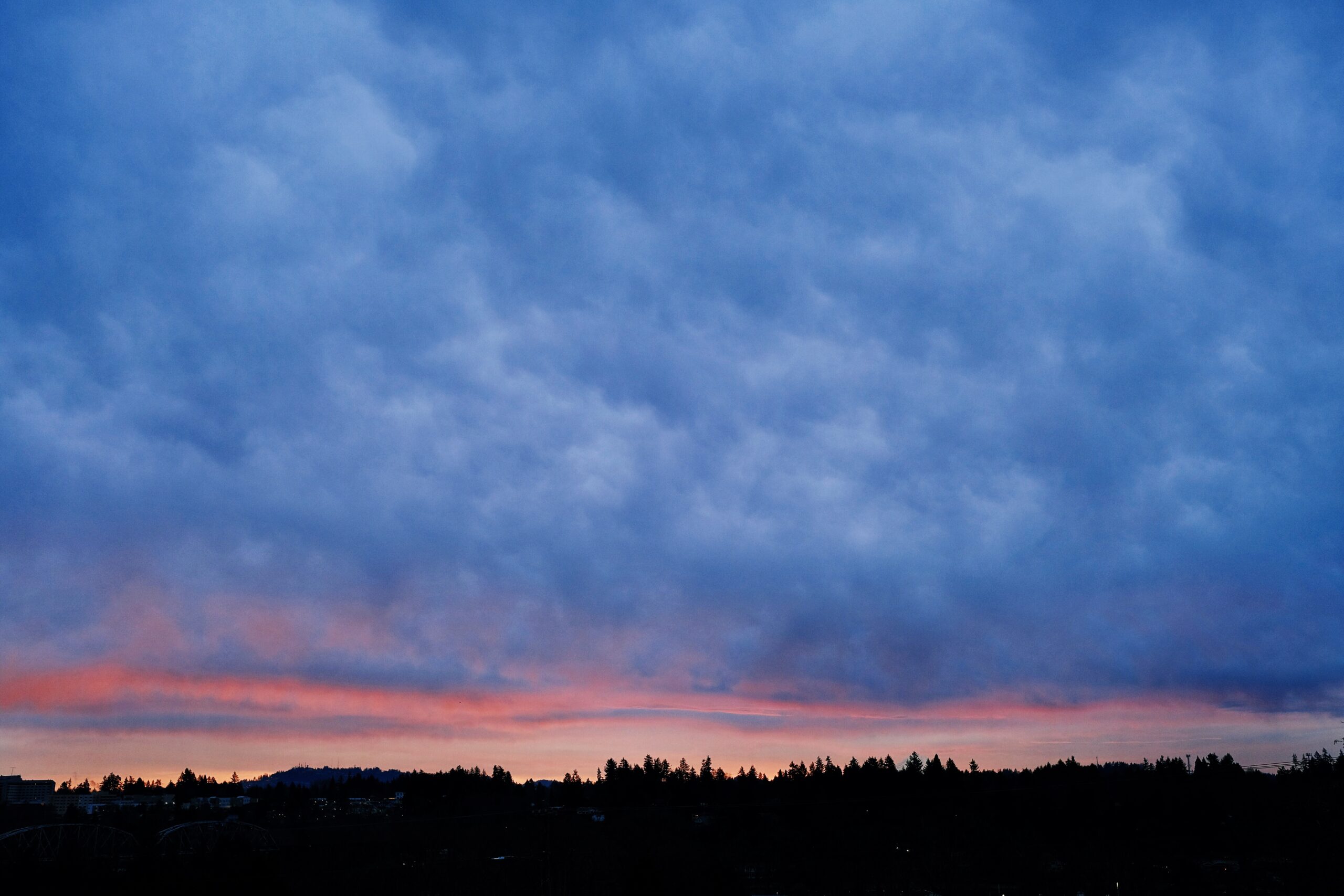 Lake Oswego, Oregon lake waterfront at dusk. Photo by Billy Cox on Unsplash (CC0 / Unsplash License).