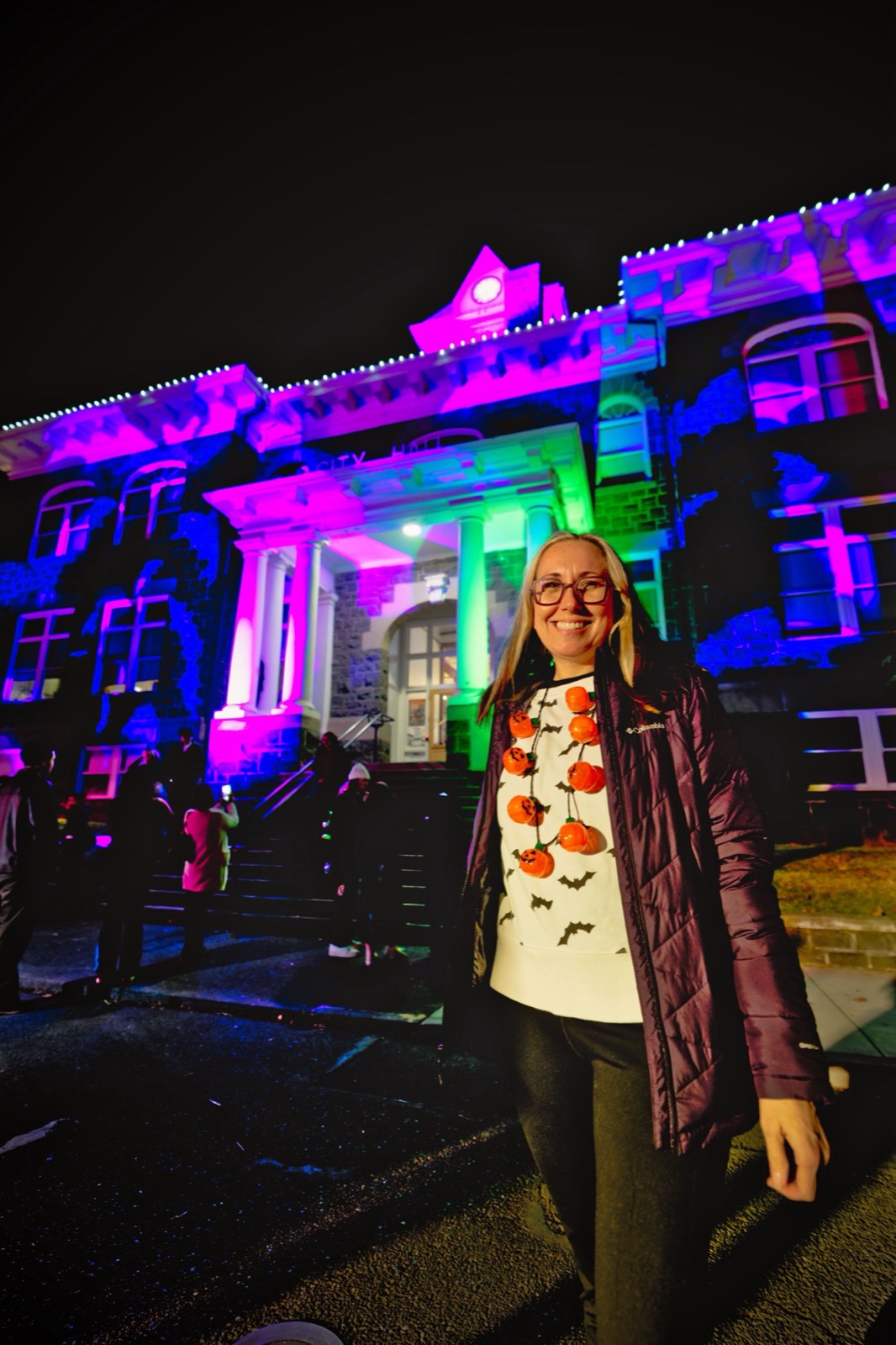 Dill Ward posing in front of St. Helens City Hall at Halloweentown